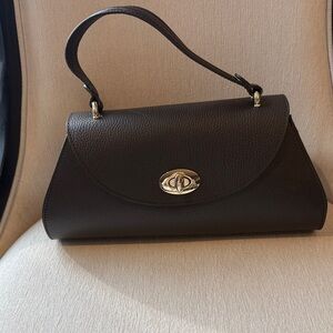 Classic Black Leather Top-Handle Satchel with Gold-Tone Turn Lock